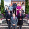 {
																																					A photograph of various team members outside the Hinckley G. Seller office
																																			