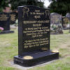 {
																																					A photograph of a tidy, clean grave site
																																			
