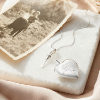 {
																																					Photograph of a 'Tree of Life' necklace
																																			