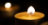 A photo of flickering church candles